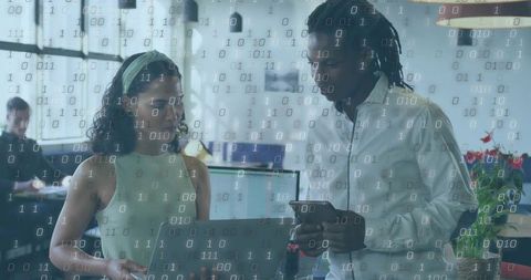 Collaborating on cybersecurity code using laptop and smartphone in modern open office