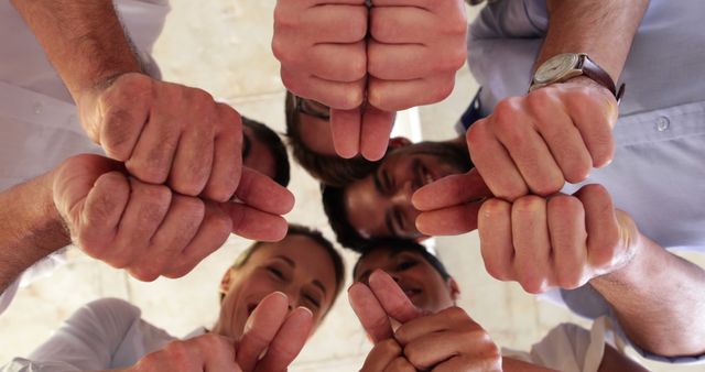 Diverse Team Thumbs-Up, Symbolizing Unity and Success - Download Free Stock Images Pikwizard.com