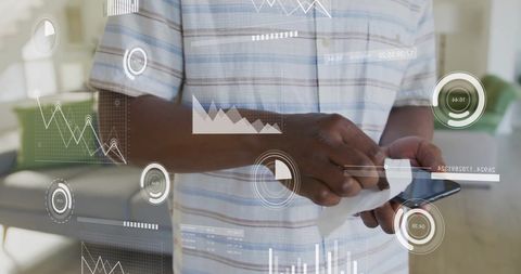 Man cleaning smartphone with digital data overlay
