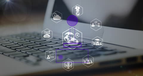 Digital Network and Technology Icons Over Laptop and VR Headset