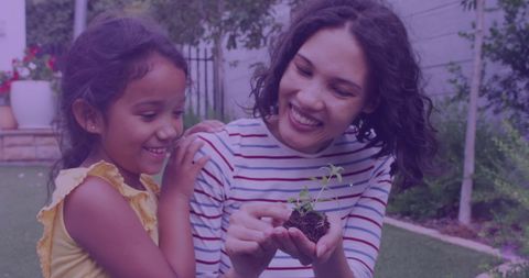 Mother and Daughter Gardening Moment