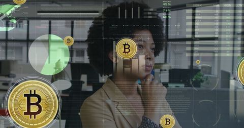 Businesswoman analyzing cryptocurrency data with digital bitcoin overlay