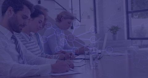 Professionals engaged in seminar with digital network interface