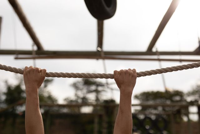 Caucasian Woman Performing Outdoor Rope Exercise in Boot Camp - Download Free Stock Images Pikwizard.com