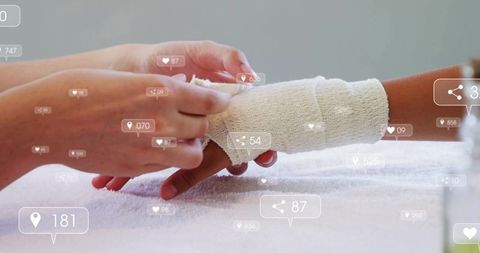 Caregiver wrapping child arm in white gauze bandage pediatric first aid social overlays