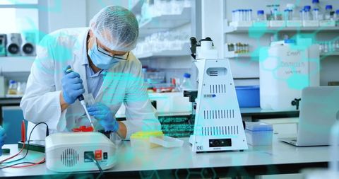 Caucasian Male Scientist Conducting Laboratory Research with Digital Data Overlay - Download Free Stock Images Pikwizard.com
