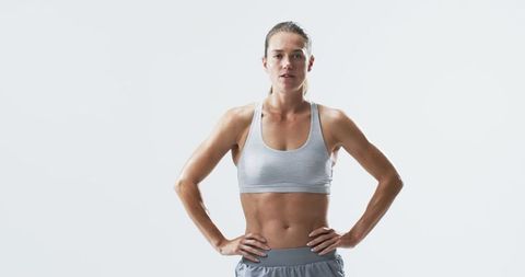 Confident Female Athlete in Sportswear Exhibiting Strength and Empowerment - Download Free Stock Images Pikwizard.com