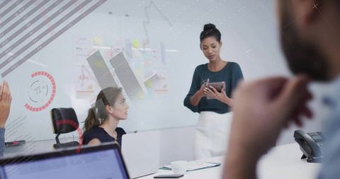 Professional businesswoman leading digital team presentation