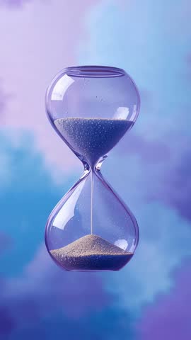 Vertical video of hourglass with fine sand falling and forming pile on pastel gradient