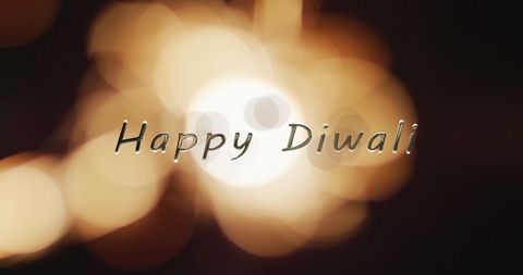 Happy Diwali Text with Glowing Festive Lights Background