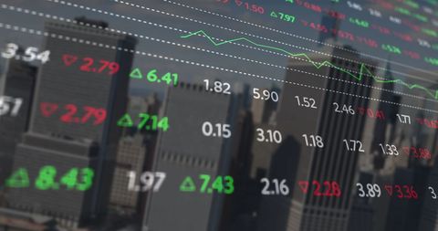 Dynamic Stock Market Data Displayed Over Cityscape