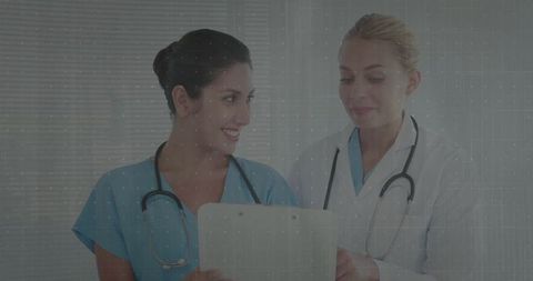 Healthcare professionals collaborating in clinical environment