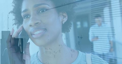 Financial Data Visualization Over Businesswoman Talking on Smartphone