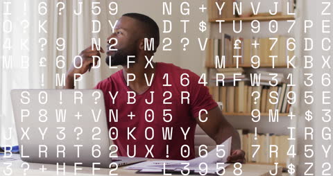 Focused Man Solving Mathematical Equations at Home