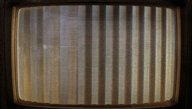 Displaying Aged CRT Screen Showing Vertical Scanlines Dusty Bezel Vintage TV Texture