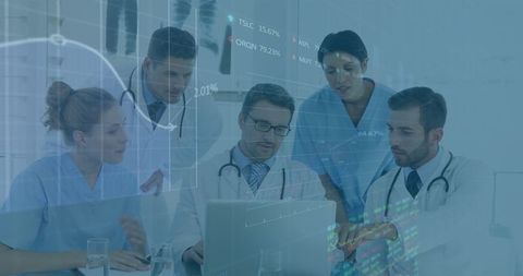 Medical team analyzing healthcare data with iot technology