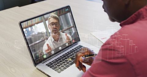 Business Professional Engaging in Virtual Meeting with Colleague