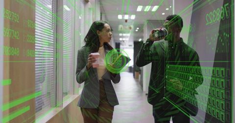 Coworkers in Office Hallway with Virtual Data Overlay