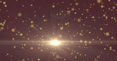 Radiant Light Flare with Bokeh on Abstract Maroon Background