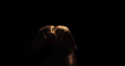 Isolated figure displaying overwhelming emotional distress