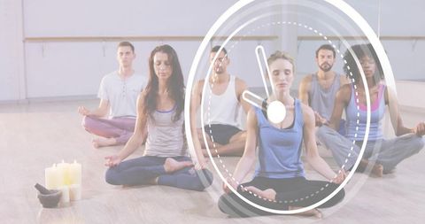 Group meditation with woman in blue tank practicing mindfulness, candles and clock overlay