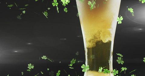 St. Patrick's Day Beer with Falling Shamrocks - Download Free Stock Images Pikwizard.com