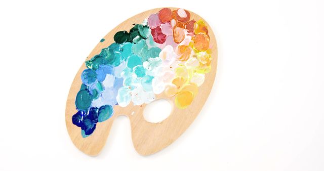 Close-up of watercolor paint on wooden palette