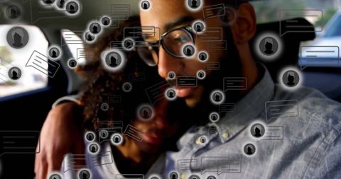 Couple in Back Seat with Floating Chat Icons Signifying Communication