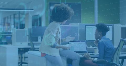 Business Professionals Analyzing Financial Data Overlaid in Office