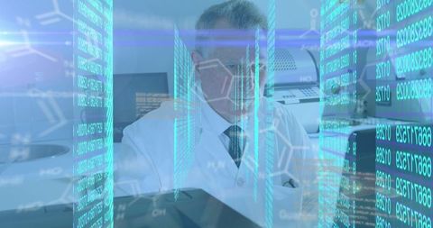 Senior Scientist Analyzing Digital Data in Laboratory