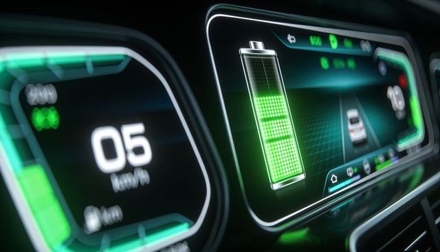 Displaying battery charge icon on ev digital instrument cluster with futuristic speedometer