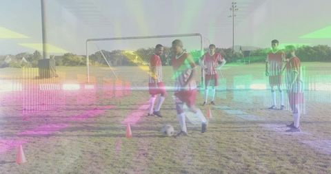 Adult Soccer Team Dribbling Drill on Grass Field with Goal and Training Cones
