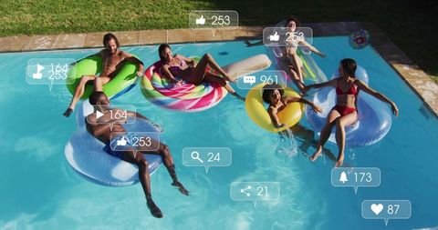 Friends lounging on colorful pool floats with social media overlay notifications, summer fun
