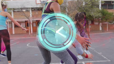 Animated Clock Overlay on Diverse Group Playing Basketball Outdoors