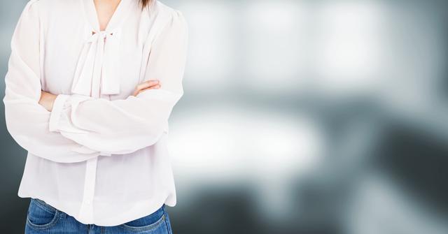 Confident Woman with Arms Crossed in Modern Office - Download Free Stock Images Pikwizard.com