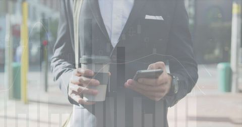 Businessman Checking Financial Data on Smartphone