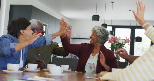 Happy Seniors Celebrating Together at Table - Download Free Stock Images Pikwizard.com