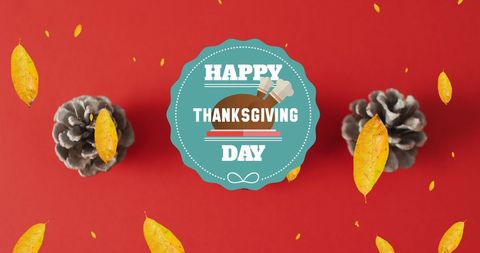 Thanksgiving Day Greetings with Autumn Leaves and Pine Cones