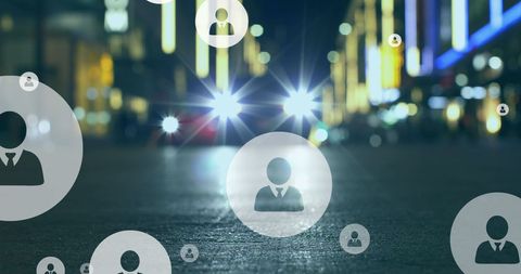 Social Media Icons Overlay on Busy Street at Night