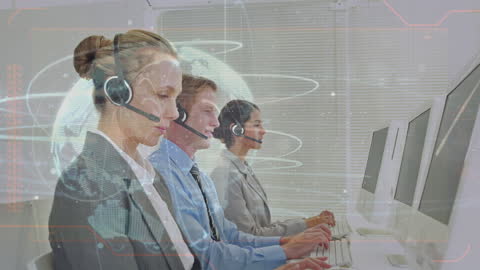 Global Business Team Using Headsets in Contemporary Office