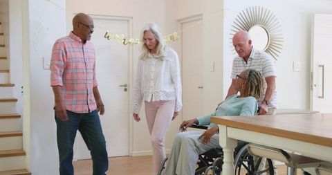 Senior Friends Engaging in Joyful Conversation at Home