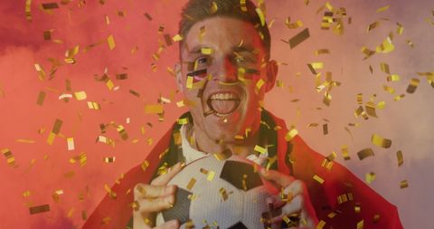 Energetic Soccer Fan Celebrating Victory in Exciting Party Atmosphere