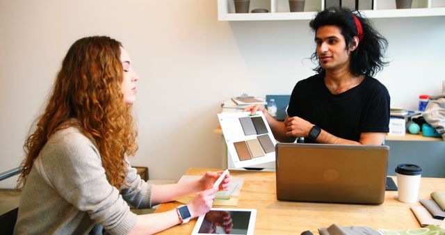 Designers Discussing Color Samples in Modern Office - Download Free Stock Images Pikwizard.com