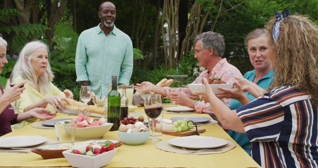 Happy Family Enjoying Outdoor Picnic with Food and Wine - Download Free Stock Images Pikwizard.com