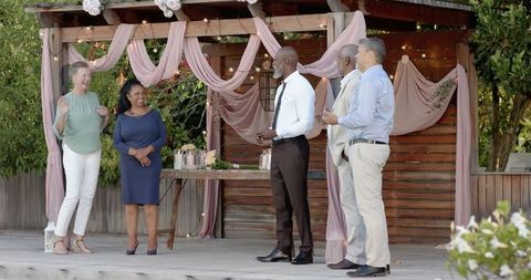 Diverse Seniors Celebrating Together on Outdoors Stage