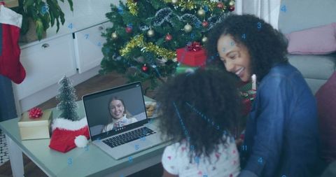 Mother and Daughter Video Calling During Christmas Celebration