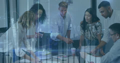 Diverse Team Analyzing Data during Office Meeting