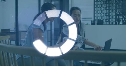 Business team collaborating on data strategy in modern office