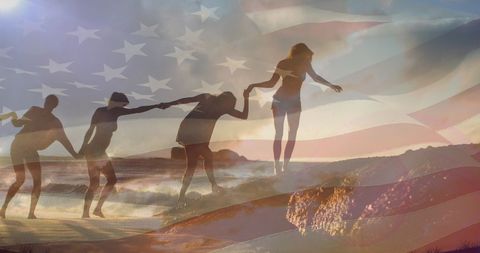 American Patriotism with Friends Celebrating on Beach at Sunset