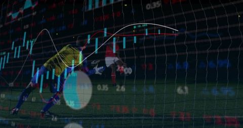 Diving Goalkeeper with Digital Financial Graph Overlay in Night Match